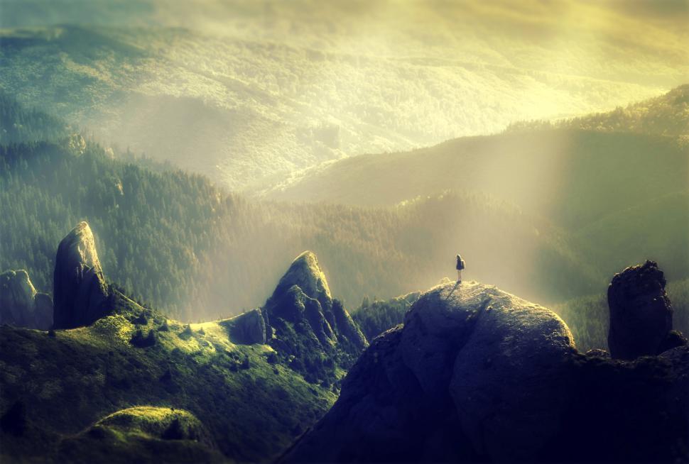 woman-alone-at-the-top-of-the-mountain